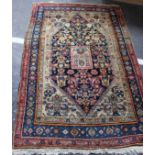 A Middle Eastern rug 164 x 107cm