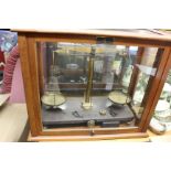 Mahogany cased set of pan scales by Griffin And Tatlock, glass sides and top to case, height