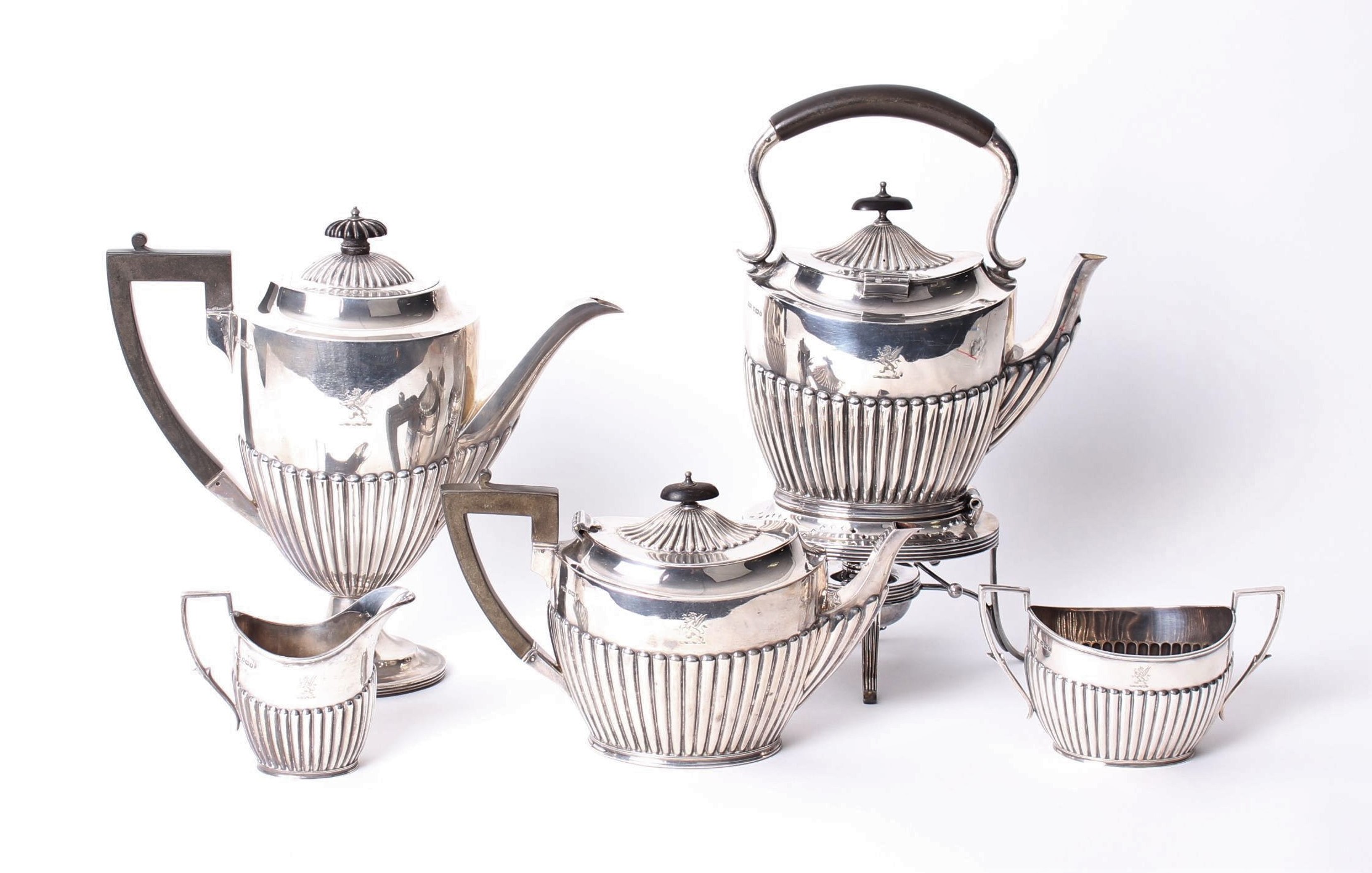 A five piece Edwardian sterling silver tea set by James Dixon & Son, Sheffield 1905, with sterling