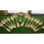 A collection of Victorian and later sterling silver flatware, to include eleven tea spoons and three