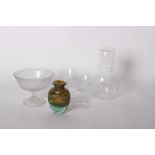 A collection of glass ware to include a Mdina glass vase, a cut glass bowl etc.