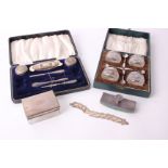 A boxed set of cut glass and silver rimmed salts, made and retailed by Alexander Clark Co. Ltd,