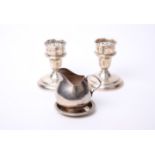 A pair of Birks of Canada candlesticks, squat design with pierced sconces, marked Birks Sterling;