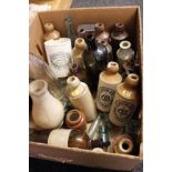 A collection of Victorian and later ceramic and glass bottles and jars.