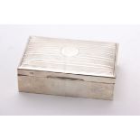A sterling silver cigarette box with cedar lining, Chester 1911, 13.7ozt gross.