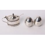 A pair of sterling silver egg shaped pepperettes by William Hutton & Sons, London 1906; together