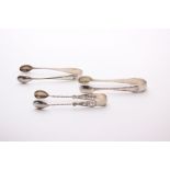 Three pairs of sterling silver sugar tongs; together with a pierced and footed silver salt (vacant