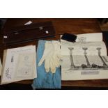 A collection of Masonic related items to include a leather cased apron with white metal fittings,