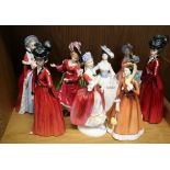 A Royal Doulton figure 'Spring Morning' HN1922; together with eight other Royal Doulton figures