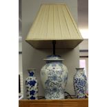 A collection of blue and white and Oriental pottery to include a large baluster shaped lamp and an