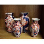 A pair of Imari pattern baluster vases, 30cm; together with a pair of smaller examples, 24cm (4)