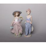 Lladro - two figures of young children with flowers, both marked 'Collectors Society 7670' with