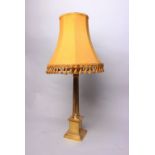 A brass Corinthian column table lamp on square stepped base. 57cm.