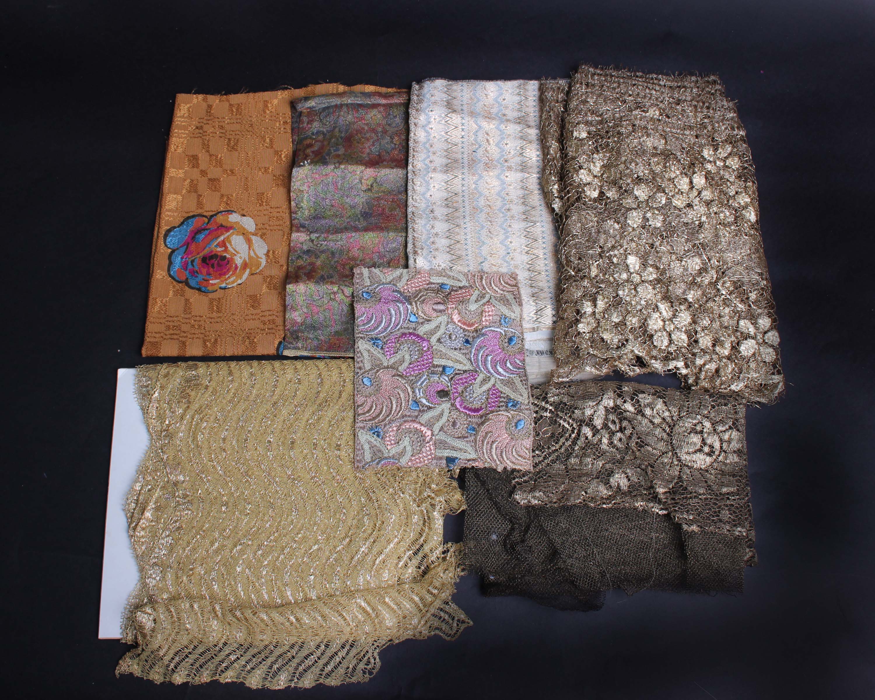 A collection of trimmings, comprising 3 metres early 20th Century French gold metallic lace, 2.6