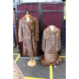 A Swan and Edgar 1950s musquash fur coat; a 1950s three-quarter length fur coat, a musquash fur coat