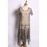 A 1920s Honesty patterned silver metallic lace short sleeved three-quarter length cocktail dress and