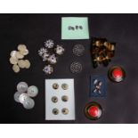 Six Regency pearl buttons; six 19th Century blue enamel buttons, 19th Century carved pearl