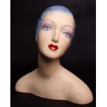 A mid to late 20th Century painter plaster shop display mannequin head, with over-painted features