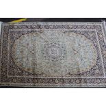 A green ground Kashan carpet, 230 x 160cm