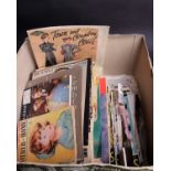 A collection of fashion and sewing magazines, dating from the 1920s to the 1950s