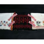 A late 19th Century Ottoman fine cotton cream Turkish towel embroidered at each end with colourful