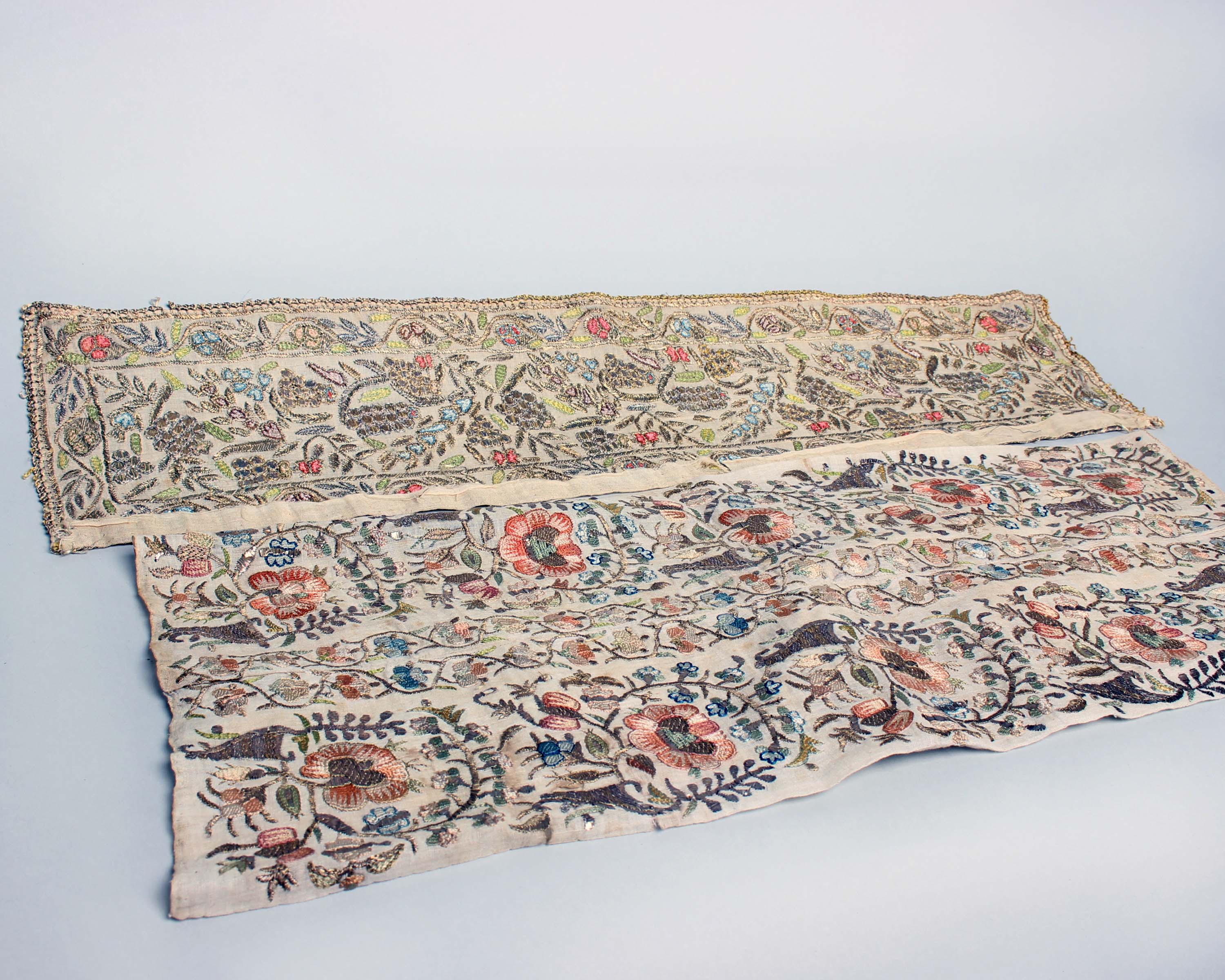 A Turkish late Ottoman 19th Century panel (a pair of towel ends sewn together) with an embroidered