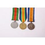 Two First World War medals: a 1914-19 medal and Defence medal to 115575 GNR J. Barton RA.;