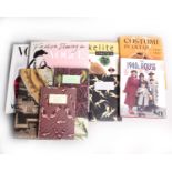 A collection of fashion related books, including The Art of Vogue Covers, Castle Howard costume, The