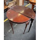 A 19th century mahogany D-end side table on cabriole feet together with a D-end mahogany side