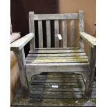 A teak slat back garden chair, slats detached