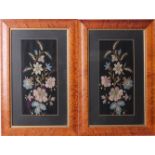 A pair of early 20th Century embroidered silk panels within modern frames