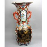 A 19th century Japanese Porcelain hall vase of baluster outline and flared floral lip with moulded