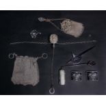 A 19th Century unmarked white metal chain mail purse and chatelaine clip, with filigree clasp,
