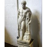 A painted plaster garden statue of Hercules on a square plinth base. Total height 92cm.