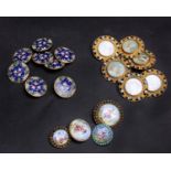 A set of six late 19th Century A.P & Cie Paris gilt metal buttons, each with a central image of a