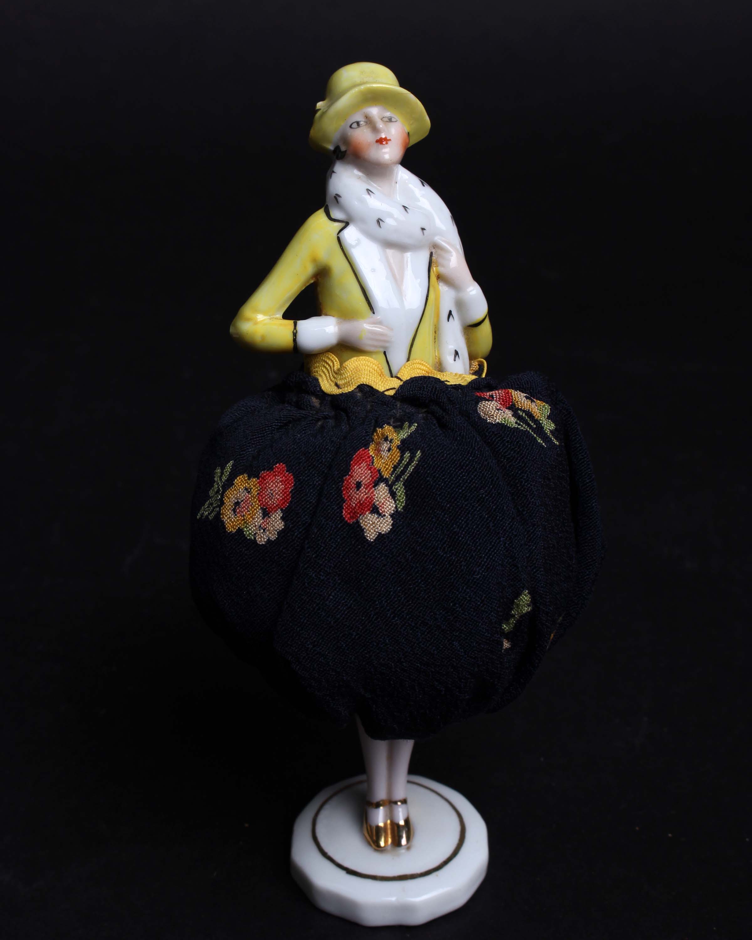 A 1920s ceramic pin doll dressed in yellow and black, stamped Germany on the base. A bisque china - Image 3 of 4