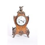 A French 19th Century ormolu and rosewood mantle clock with marquetry inlay, white enamel dial