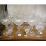 A set of nine deep bowl wine glasses, with hobnail and etched decoration, together with seven