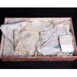 A French pink fabric covered box, containing a collection of 19th and early 20th Century machine and