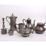 A pair of pewter flagons by Cooper Brothers, Sheffield, one presented in 1905, together with a group