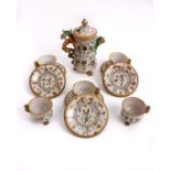 An early 20th century Italian Majolica six piece coffee set decorated with classical scenes and with