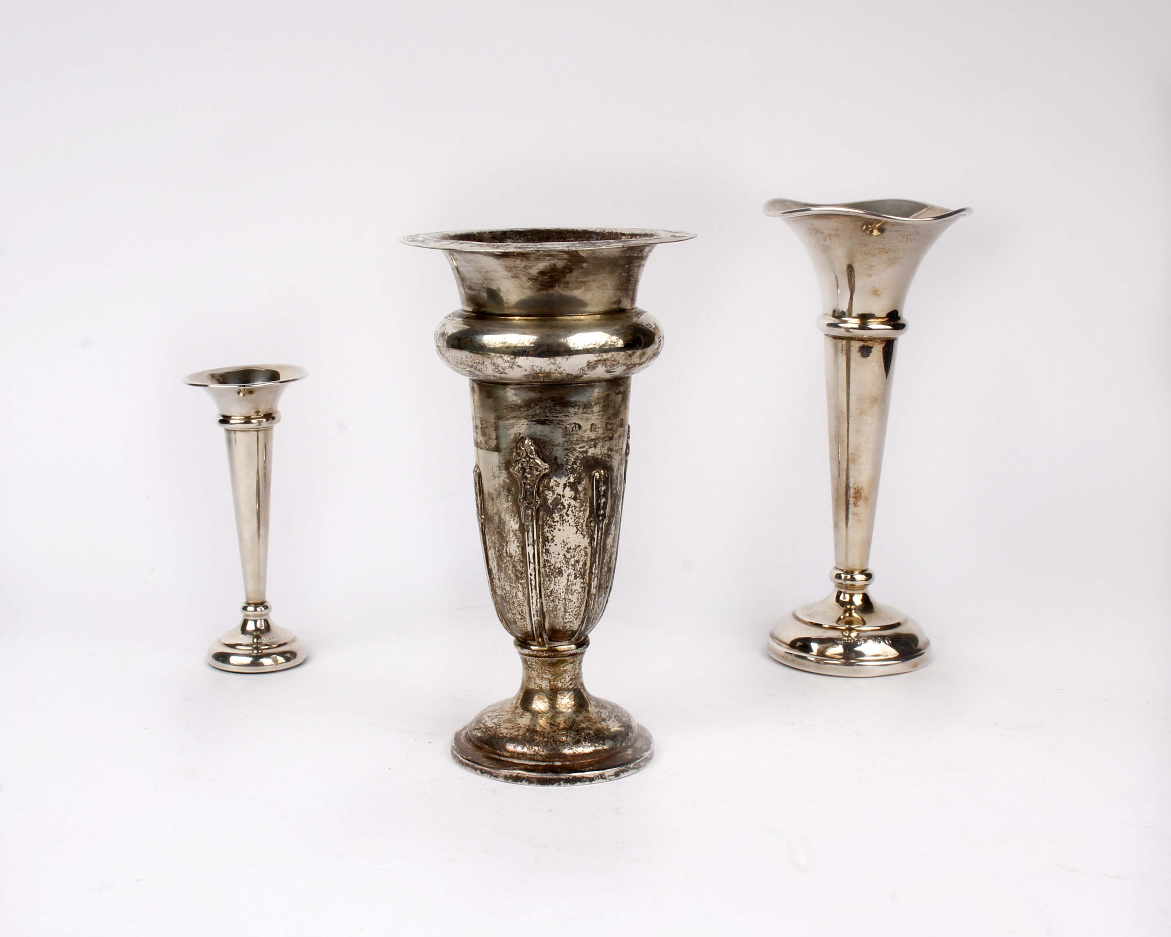 Three sterling silver trumpet vases, 7.1ozt