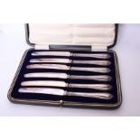 A cased set of six sterling silver handled butter knives, Mappin & Webb, Sheffield 1919.