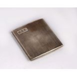 A sterling silver cigarette case with engine turned design by Deakin & Francis Ltd, Birmingham.