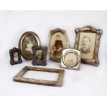 A collection of sterling silver picture frames. (7)