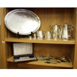 A collection of silver plates items to include a large oval pierced galleried tray, a five piece tea