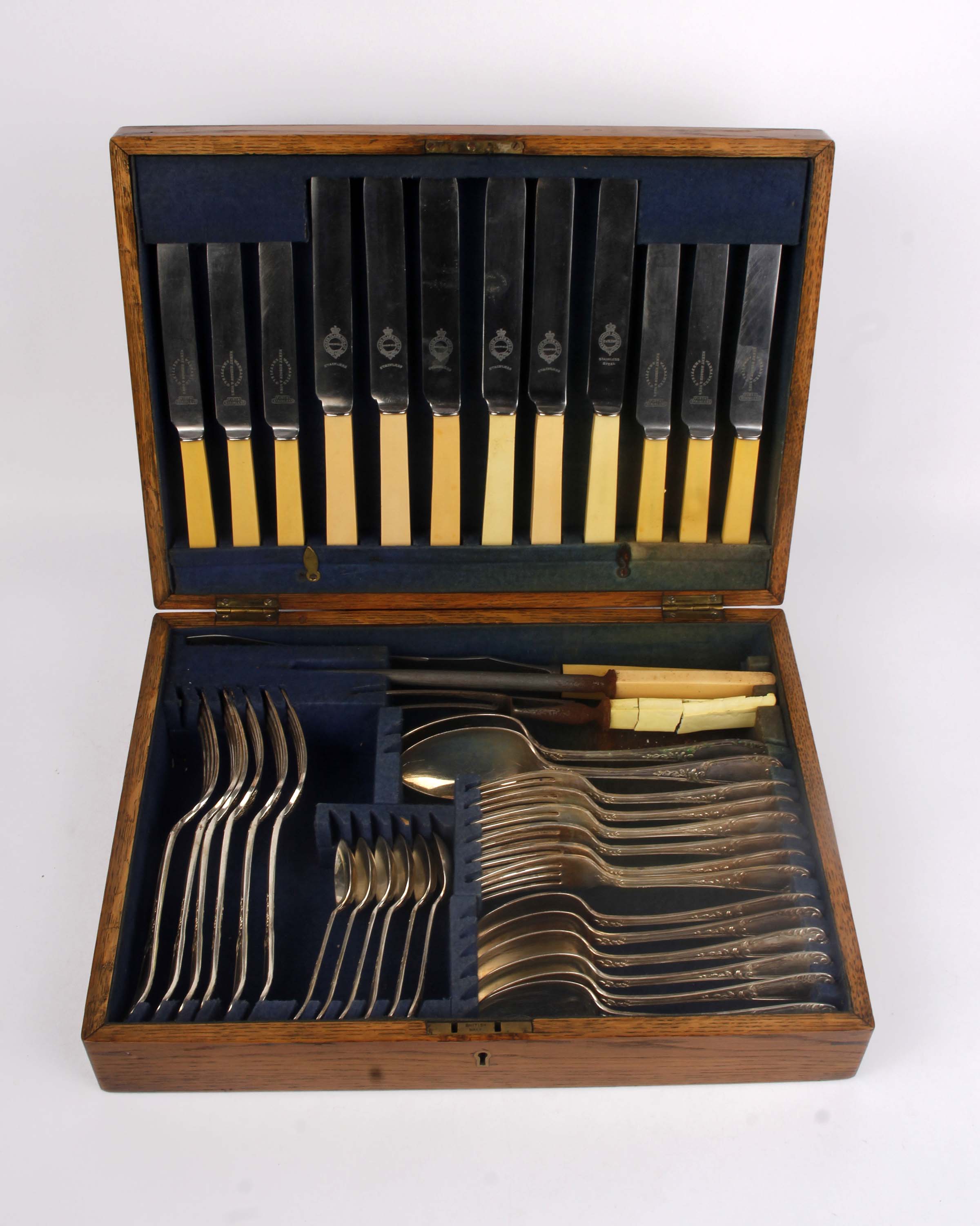 A boxed canteen of plated cutlery.