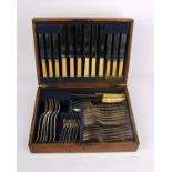 A boxed canteen of plated cutlery.