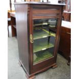 A late 19th century mahogany sheet music cabinet with glazed door