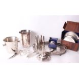 A collection of electroplated wares, to include silver plated place settings with matching coasters,